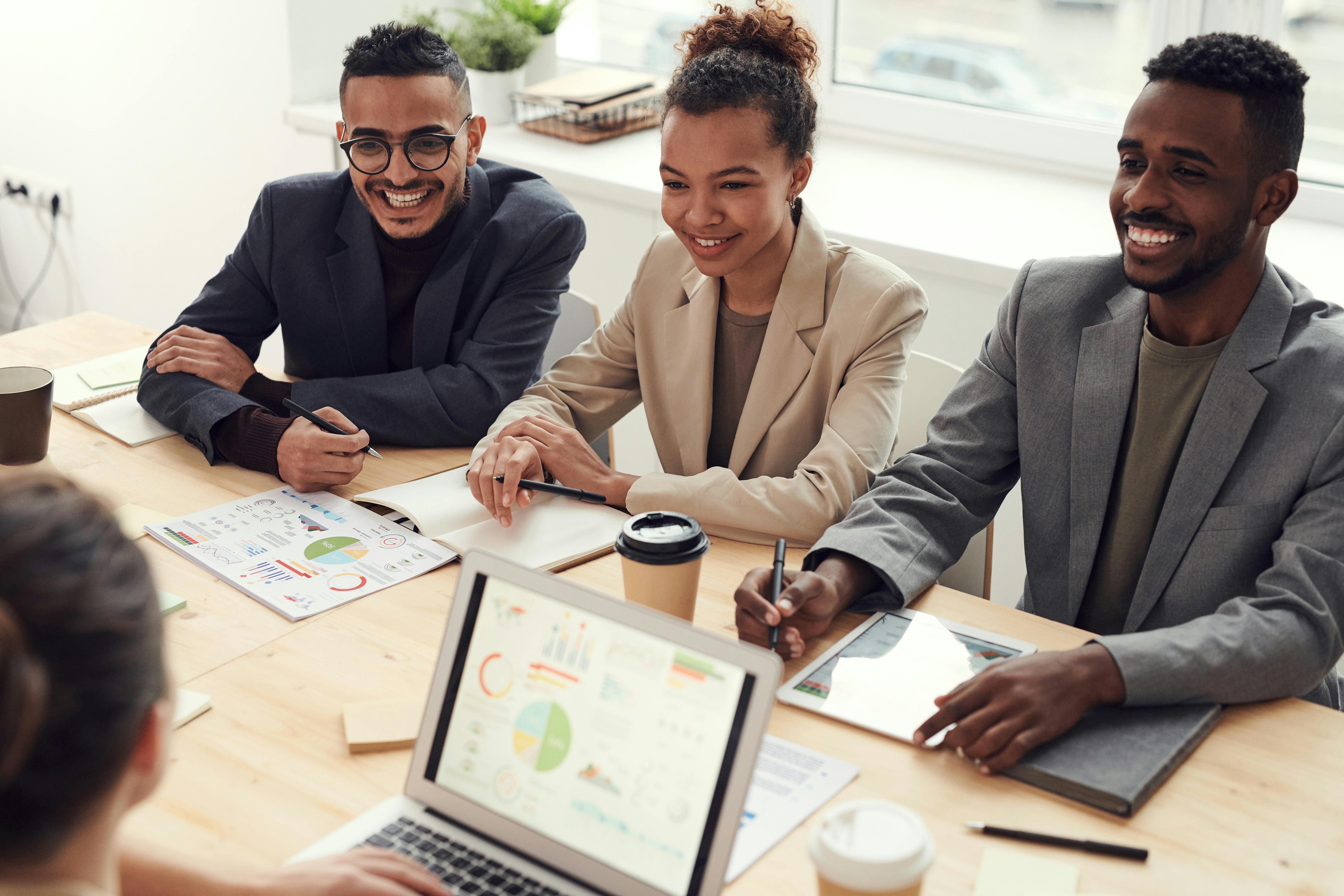 Team collaborating on Pardot marketing automation platform